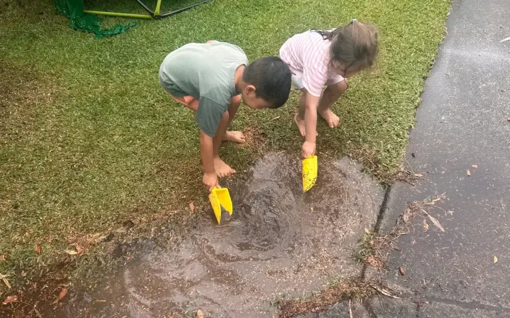 Little kids building social skills through group play at preschool