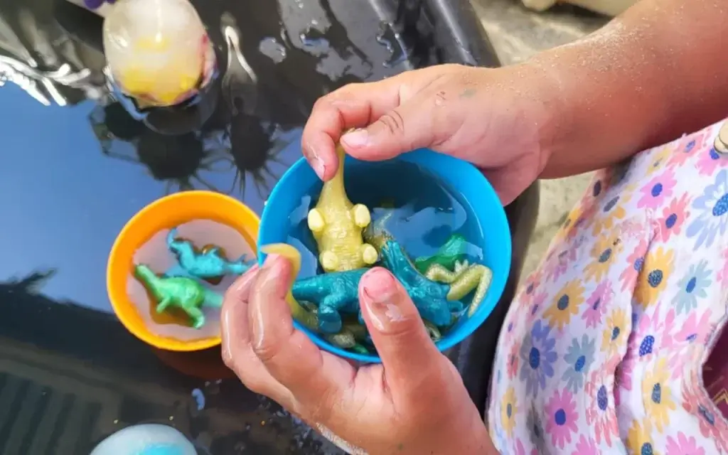 Preschool children sitting in a circle during story time, listening attentively and taking turns to speak. how to foster social learning in preschoolers